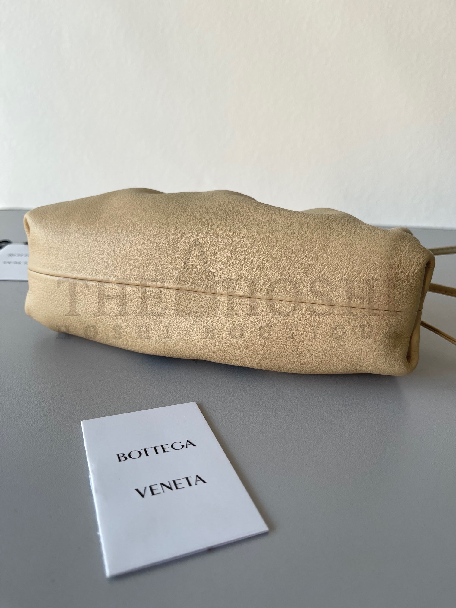 B0tt*ga Ven*ta Mini Pouch with Strap in Almond Calfskin Master Quality