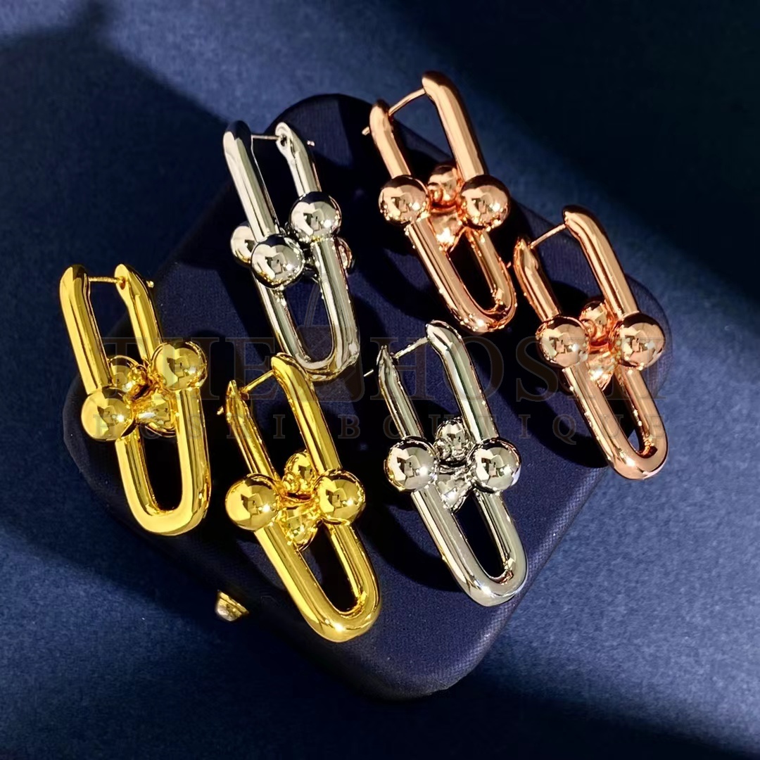 T*f*ny earring Master Quality