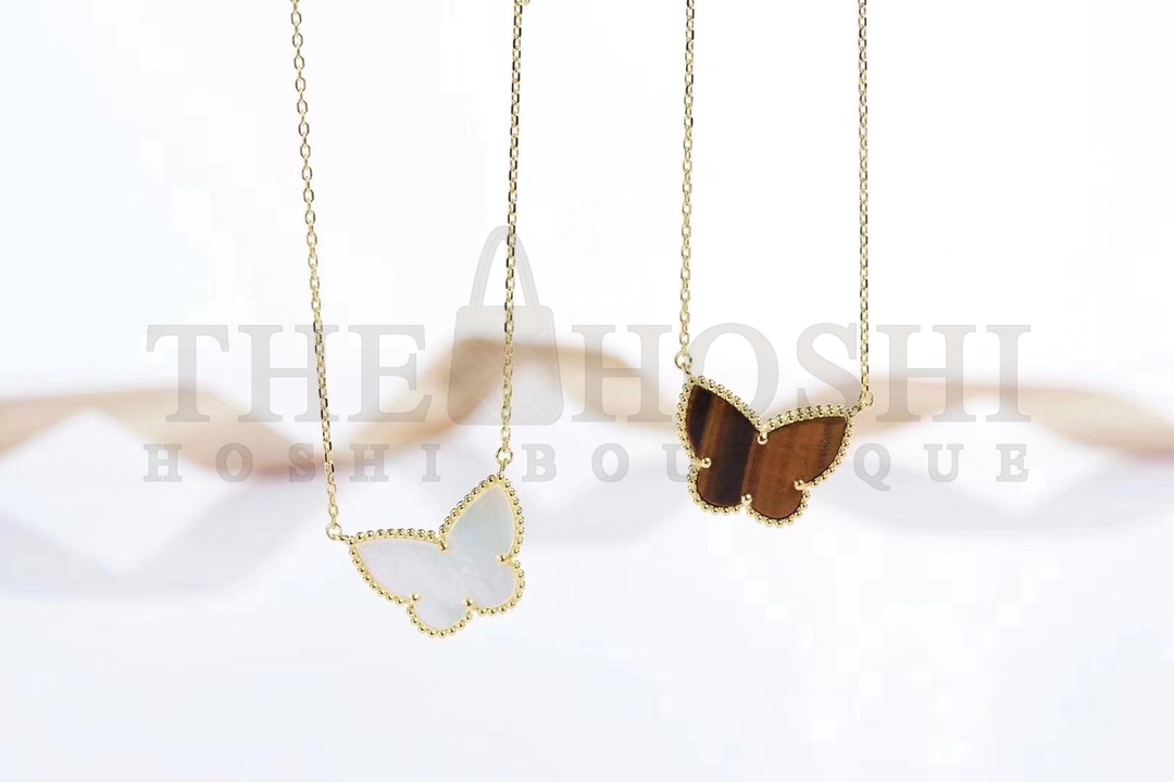 V*n Cl**f & Arpels butterfly necklace in white mother-of-pearl Master Quality